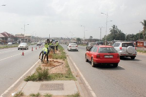 A photograph of the vehicles moving on the street