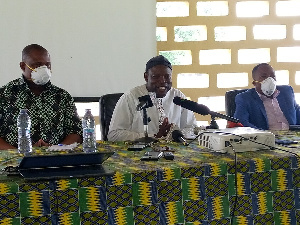 N/R Minister Salifu Sa-eed(Middle) with the Regional Director and Deputy of the Ghana Health Service