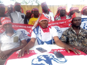 Mustapha Ahmed Anderson seated in the middle