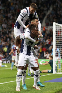 Brandon Thomas-Asante is joined by teammates to celebrate his goal