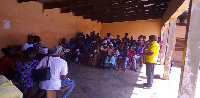 Samuel Atando Akolgo, Acting Garu District Director of the NCCE speaking to the people