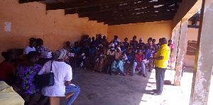 Samuel Atando Akolgo, Acting Garu District Director of the NCCE speaking to the people