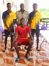 Patrick Yaw Boamah with some of the players