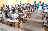 Some students sitting for the mock exams