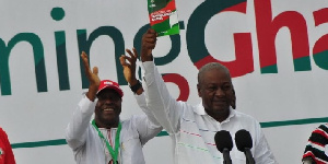 Mahama holding the Green Book