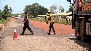 Workers were seen busy with road improvement works.