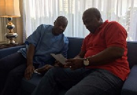 Alhaji Seidu Ahmed Karabache (L) with President Mahama