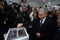 One of the five candidates, former Prime Minister Ali Benflis, was photographed voting on Thursday m