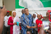 Goosie Tanoh interacting with others during his tour to the Central Region