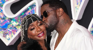 Sean Diddy Combs kissing his mother