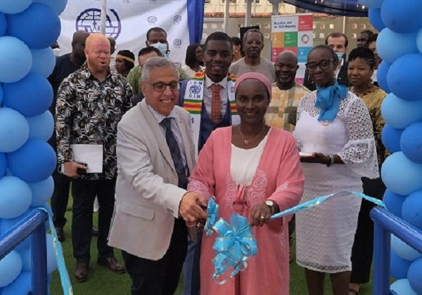 Dr Marwan (left) and Ms Wane cutting the tape to open the facility