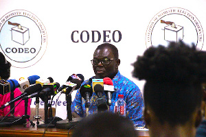 Albert Arhin, National Coordinator for CODEO addressing the media