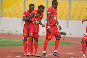 Imoro Ibrahim hugs goal scorer Richmond Lamptey