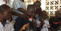 Library Photo: Sanusi Issah (middle) reading a statement in an earlier Press Conference