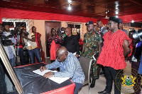 President Akufo-Addo signing the book of condolence in honour of Togbe-Gabusu