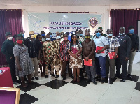 Yaw Boadu-Ayeboafoh, NMC Chairman in a group picture with participants