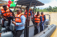 The minister was joined by others on one of the speedboats