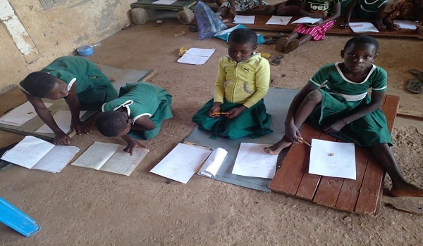 The school lacks desks and this is affecting the pupils