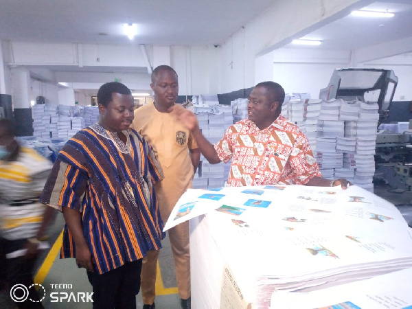 Rev John Fordjour inspecting the books at the press