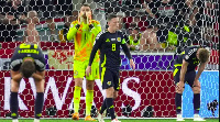 Scotland's players after Kevin Csoboth scored 100th-minute winner