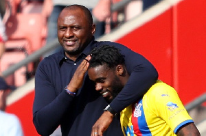 Crystal Palace manager Patrick Vieira with  Jeffrey Schlupp