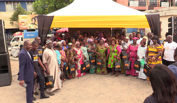 File photo; UMB department heads with some members of GAMA and market women