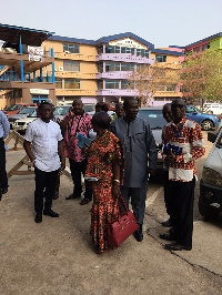 Members of the Parliamentary Select Committee ariving at the school