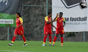 Captain Elizabeth Addo celebrating with her teammates