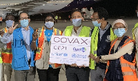 A joint WHO and UNICEF team welcome COVAX shipment in The Gambia