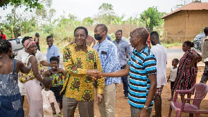 Dr. Kwabena Duffour is seen interacting with some of the people