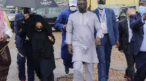 Senegalese-American performer Akon, right and his wife Rozina, arrive in Uganda