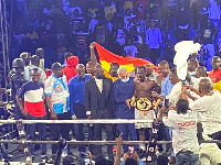 John Laryea being decorated with his title