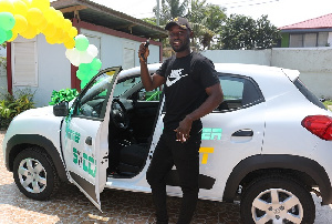 Shamsu Halid displays his keys before making a first drive