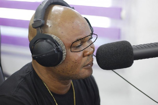 Bukom Banku wearing eyelashes