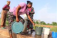 UNDP GH Nurse, Alima fetching water