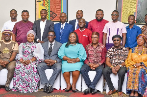 Dr. Justice Ofori, NIC Commissioner with stakeholders in Ghana's entertainment and media industry