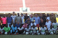 Some of the players in a group picture with the scouts