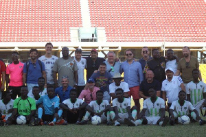 Some of the players in a group picture with the scouts