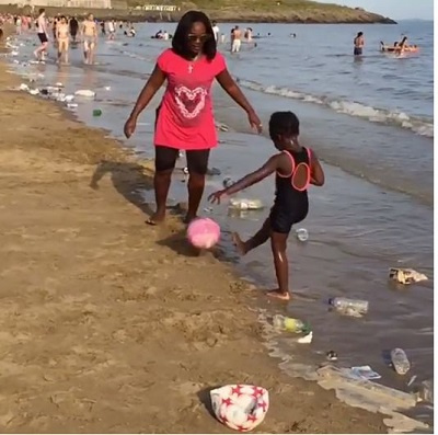 Emelia Brobbey with daughter at Barry Island beach