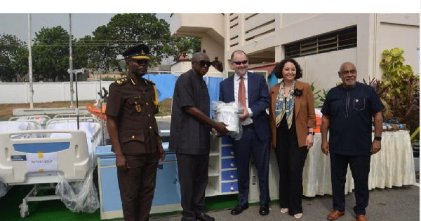 Interior Minister with UNODC handing over medical equipment to prisons service