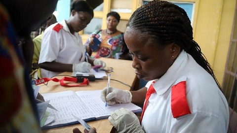 Doctors examining some patients