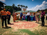 Staff of  Golden Star Resources presenting veronica buckets to Prestea Government Hospital