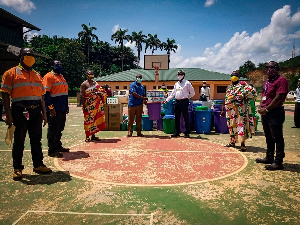 Staff of  Golden Star Resources presenting veronica buckets to Prestea Government Hospital