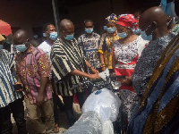 Bole Bamboi MP, Hon Alhaji Yussif (in smock)donating a motorbike to the poly clinic