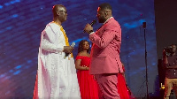 Gospel singer, Kofi Peprah with his father on stage