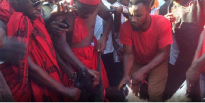 Men Prepare To Slaughter Goat