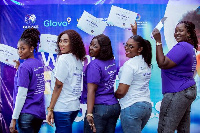 Participants display certificates received after the training