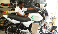 Technicians test one of the e-motobikes at Ampersand Rwanda’s workshop at Kimihurura in Kigali