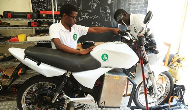 Technicians test one of the e-motobikes at Ampersand Rwanda’s workshop at Kimihurura in Kigali