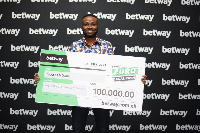 Adomako Baafi with his dummy cheque